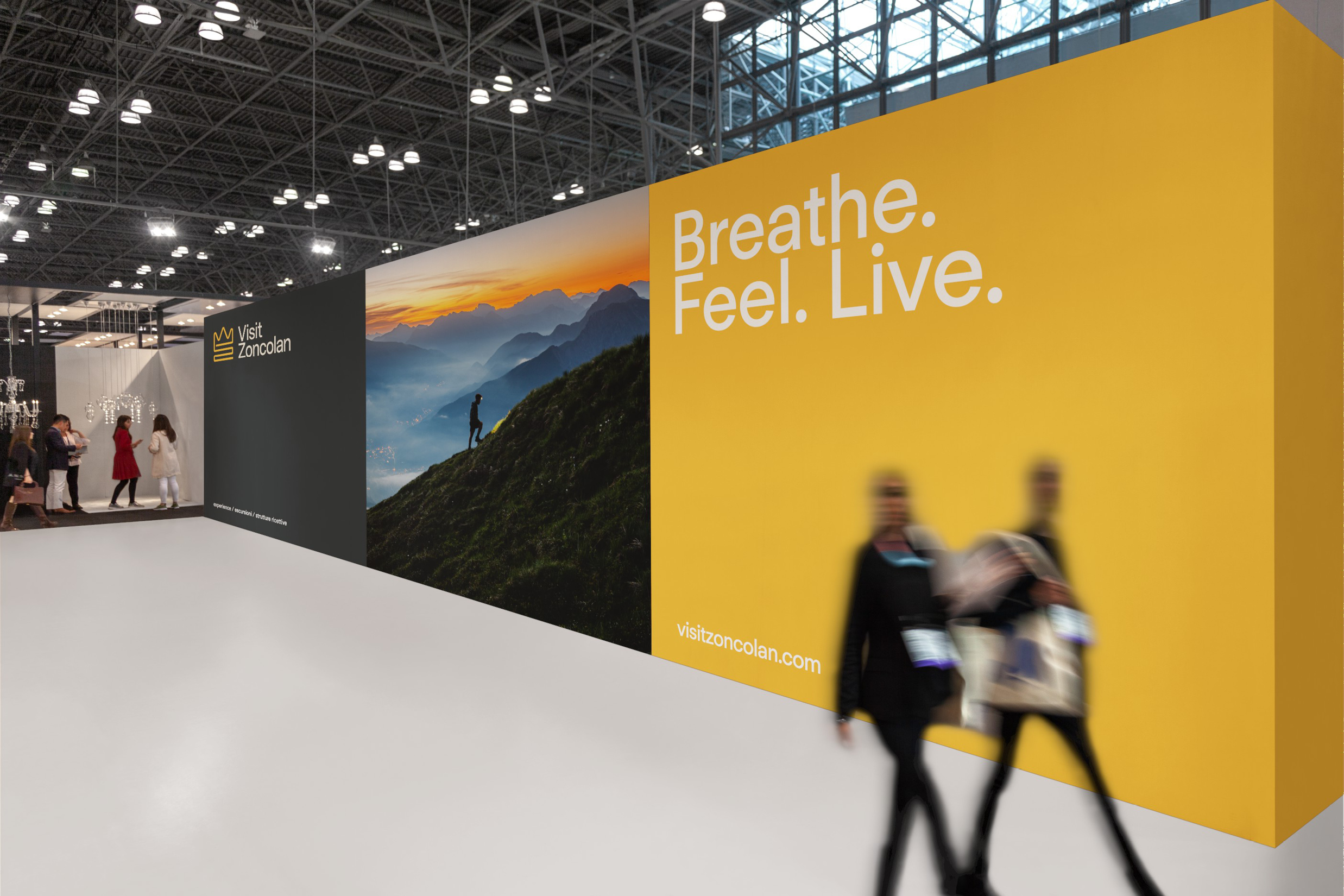 Visit Zoncolan exhibition stand with a yellow Breathe Feel Live wall